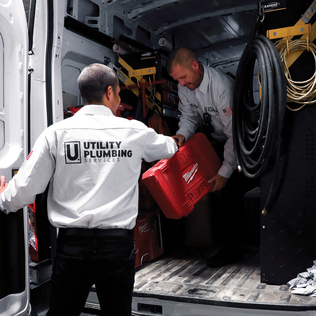 Utility Crew unloading work van