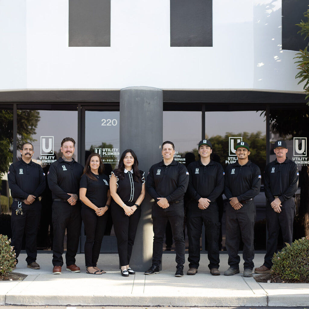 utility plumbing team photo outside rancho cucamonga office