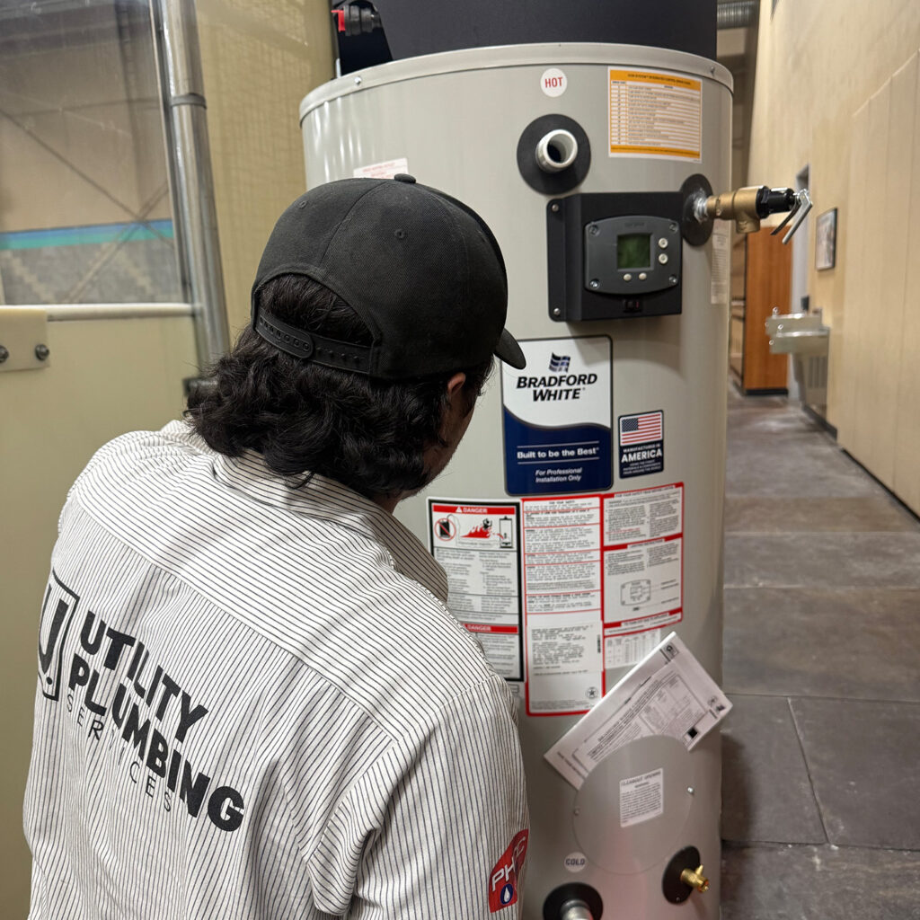 utility plumbing services bradford white electric water heater installation